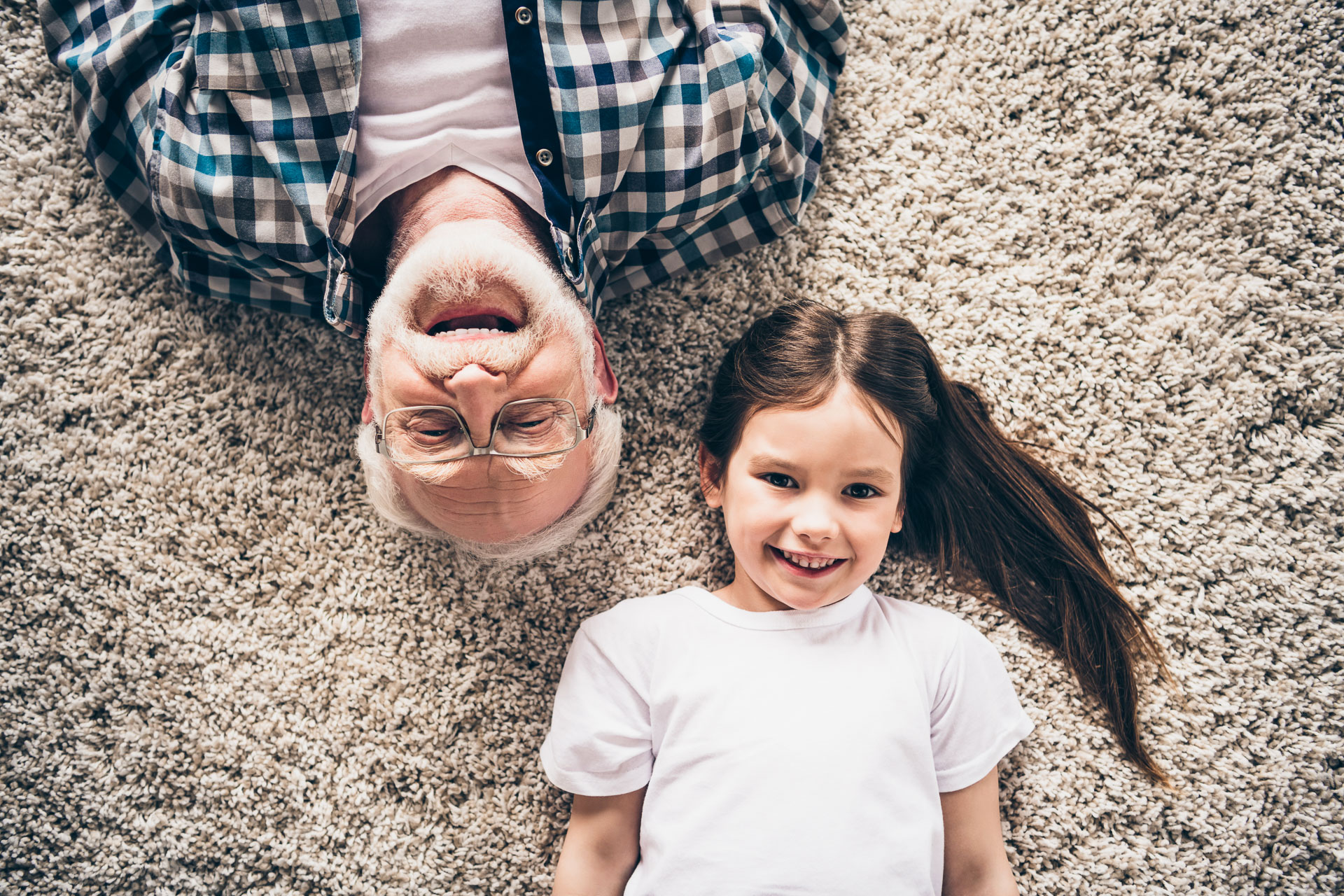 Grandpa and Granddaughter enjoying carpet