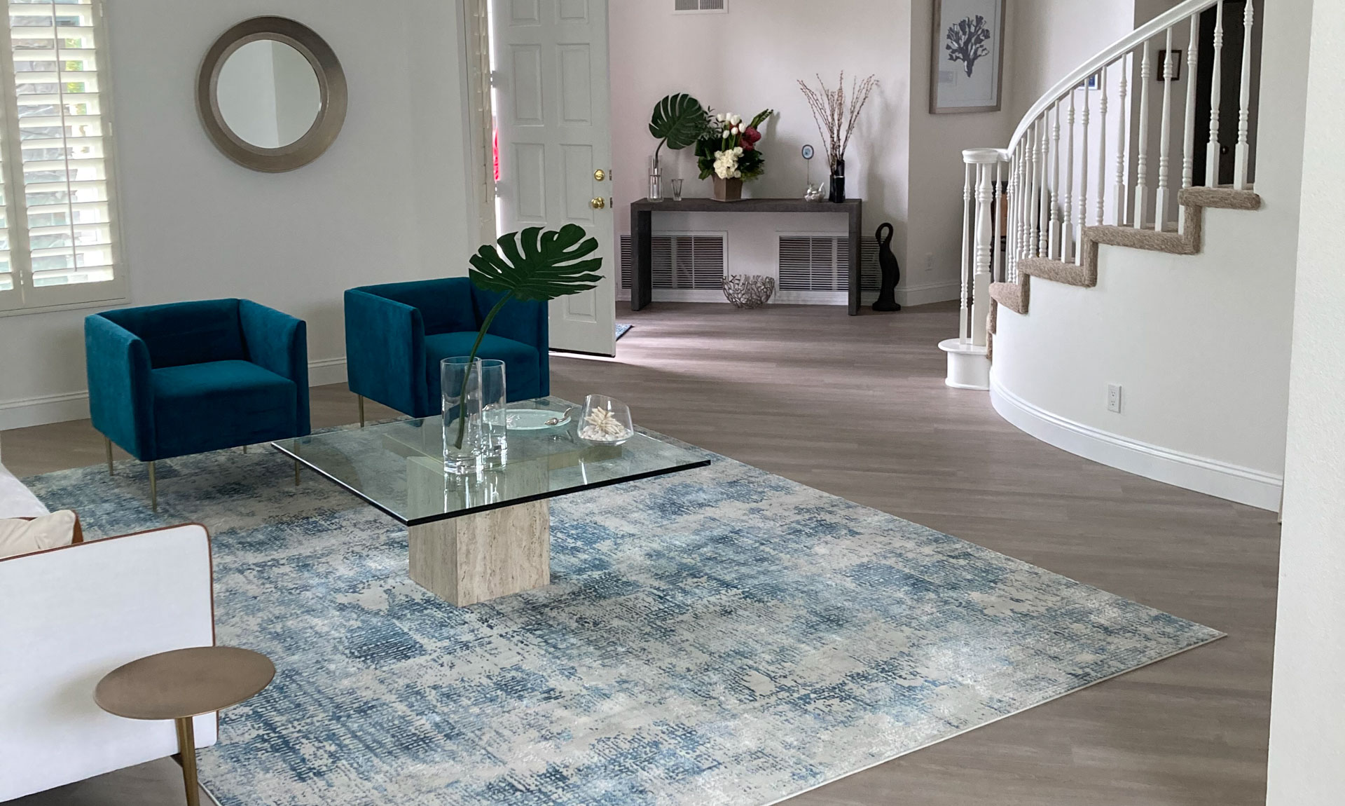 Area rug and luxury vinyl installation by Saddleback Carpet