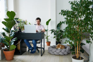 Remote worker with lots of green plants