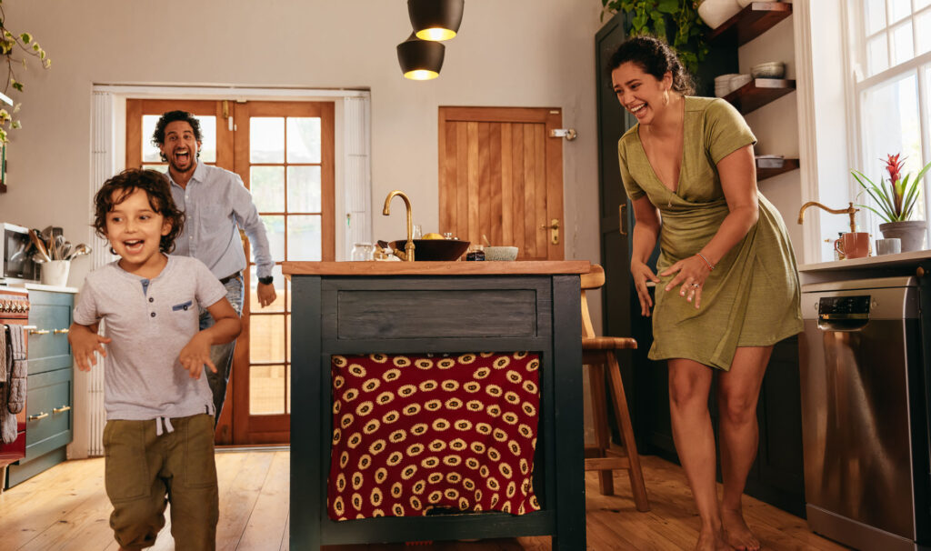 Family playing in the kitchen