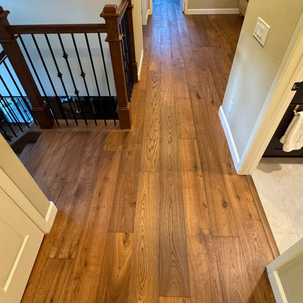 Our latest installation in Foothill Ranch showcases the dramatic appeal of Riviera across the entry, living room, dining room, hallways, and staircase.