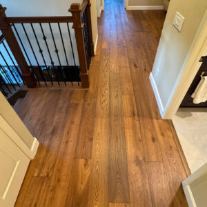 Our latest installation in Foothill Ranch showcases the dramatic appeal of Riviera across the entry, living room, dining room, hallways, and staircase.